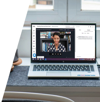 laptop showing a woman speaking at a virtual event