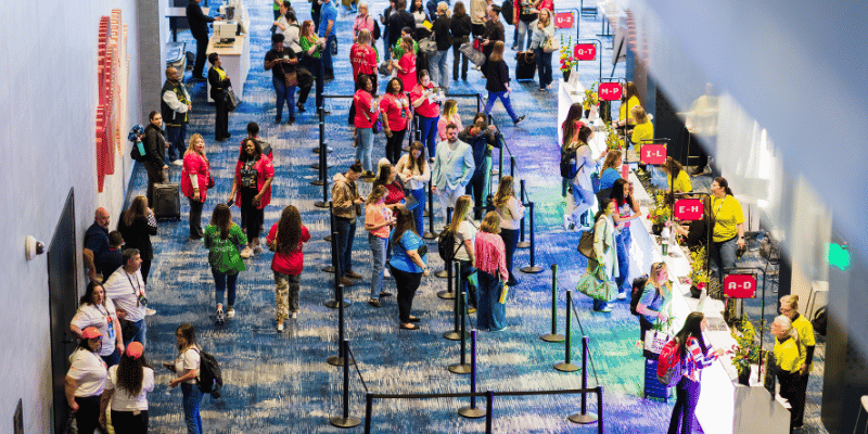 Attendees checking in at a large corporate conference