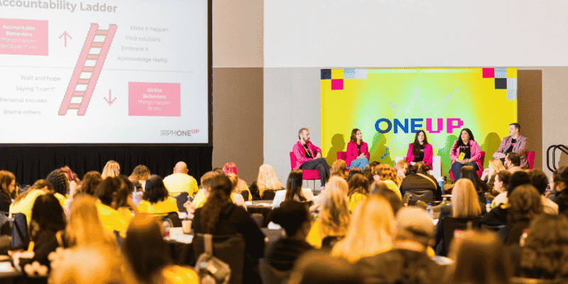 anel discussion on stage at branded corporate conference