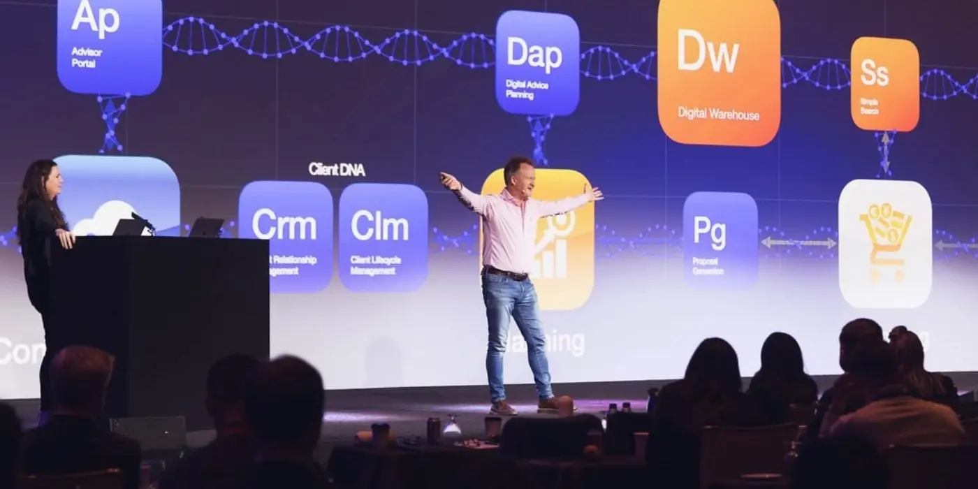 Speaker presenting on stage at annual conference