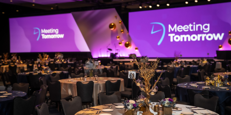 Gala ballroom with Meeting Tomorrow branded screens